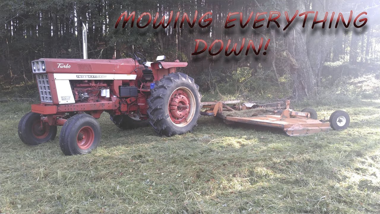 IH 1066 and Woods B315 Mowing the Farm Down