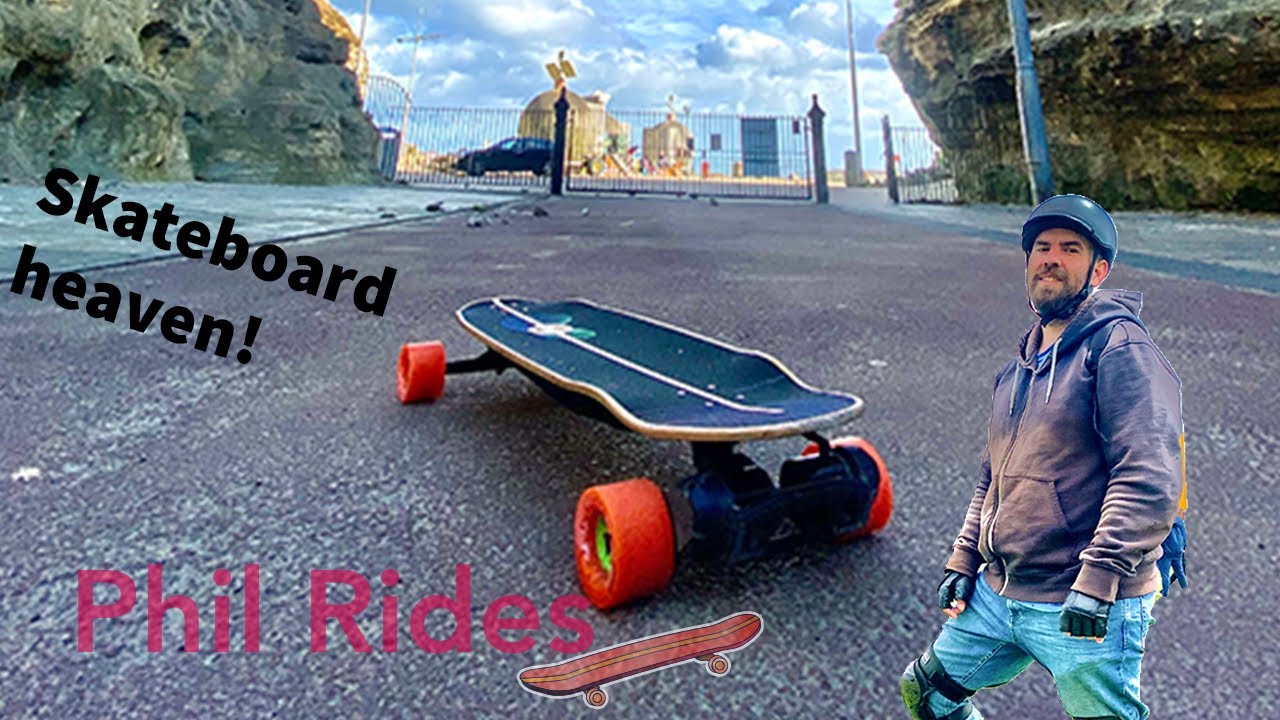 Electric Skateboard carve by the beach, Evolve Onirique 2025 - Phil Rides