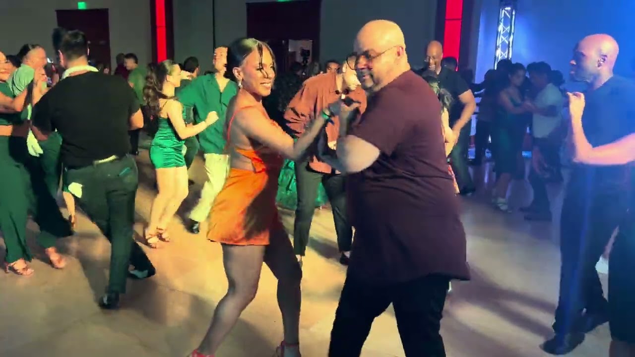 Ismael Otero and Scarlett Medrano dancing salsa at the DC Capital Congress 2025