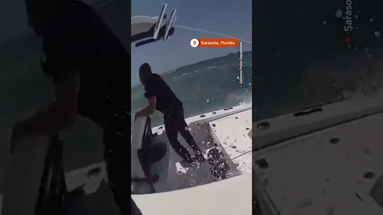 Florida cop leaps onto runaway boat