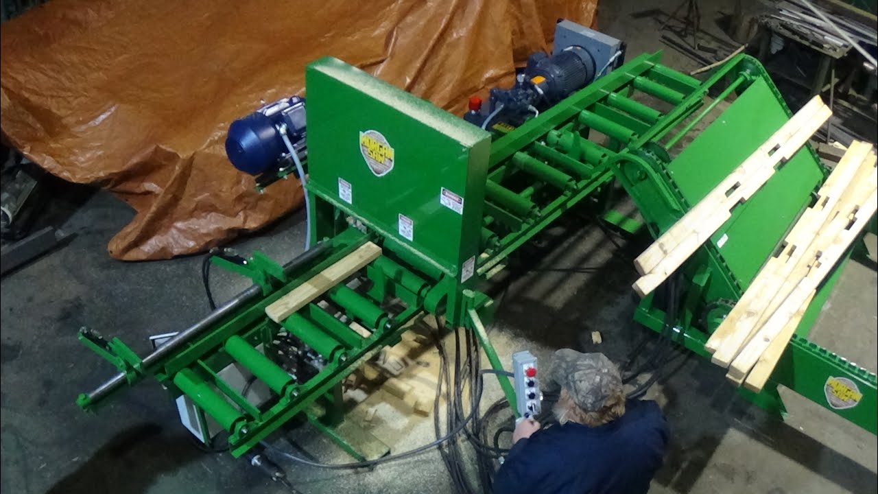 Hydraulic chop saw with unscrambler