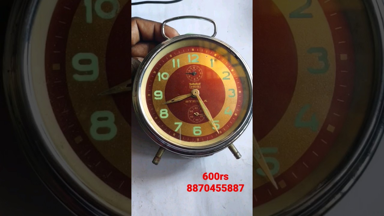 SOLD--HES STELLA Winding Alarm Clock