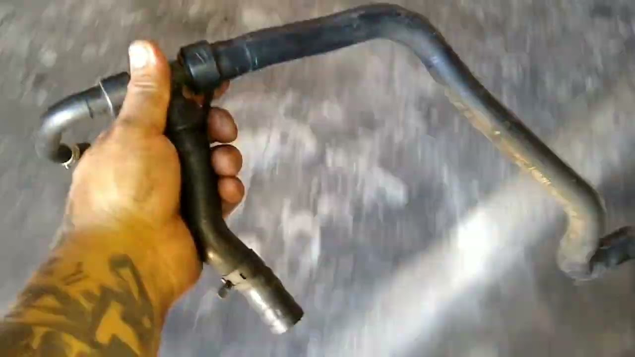 troca de mangueira de arrefecimento corsa