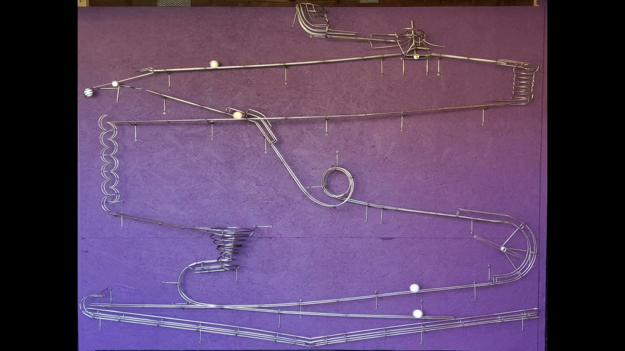 Golf Ball Return behind the service desk - Matthew Gaulden's Rolling Ball Sculpture