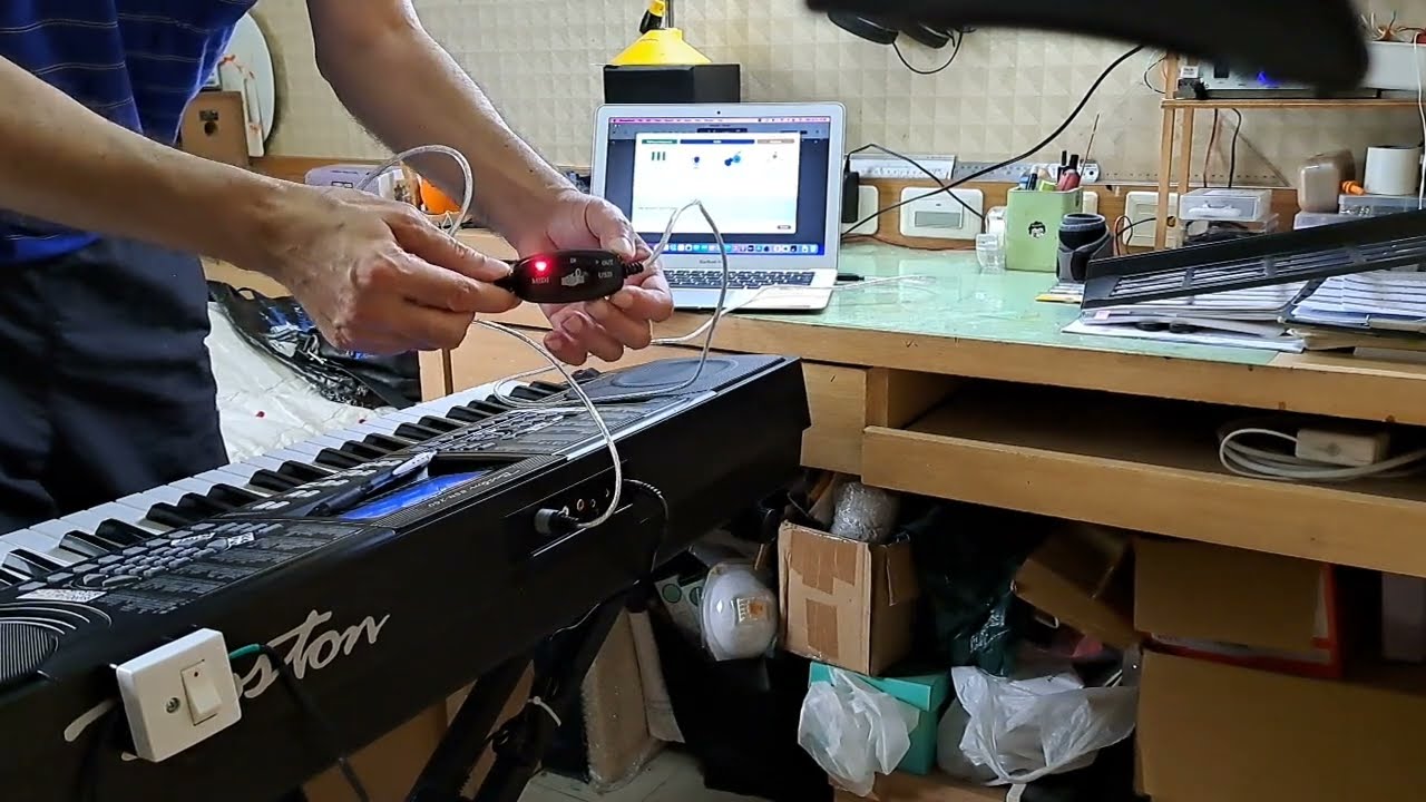 Connect your MIDI keyboard to your laptop. cheap interface.