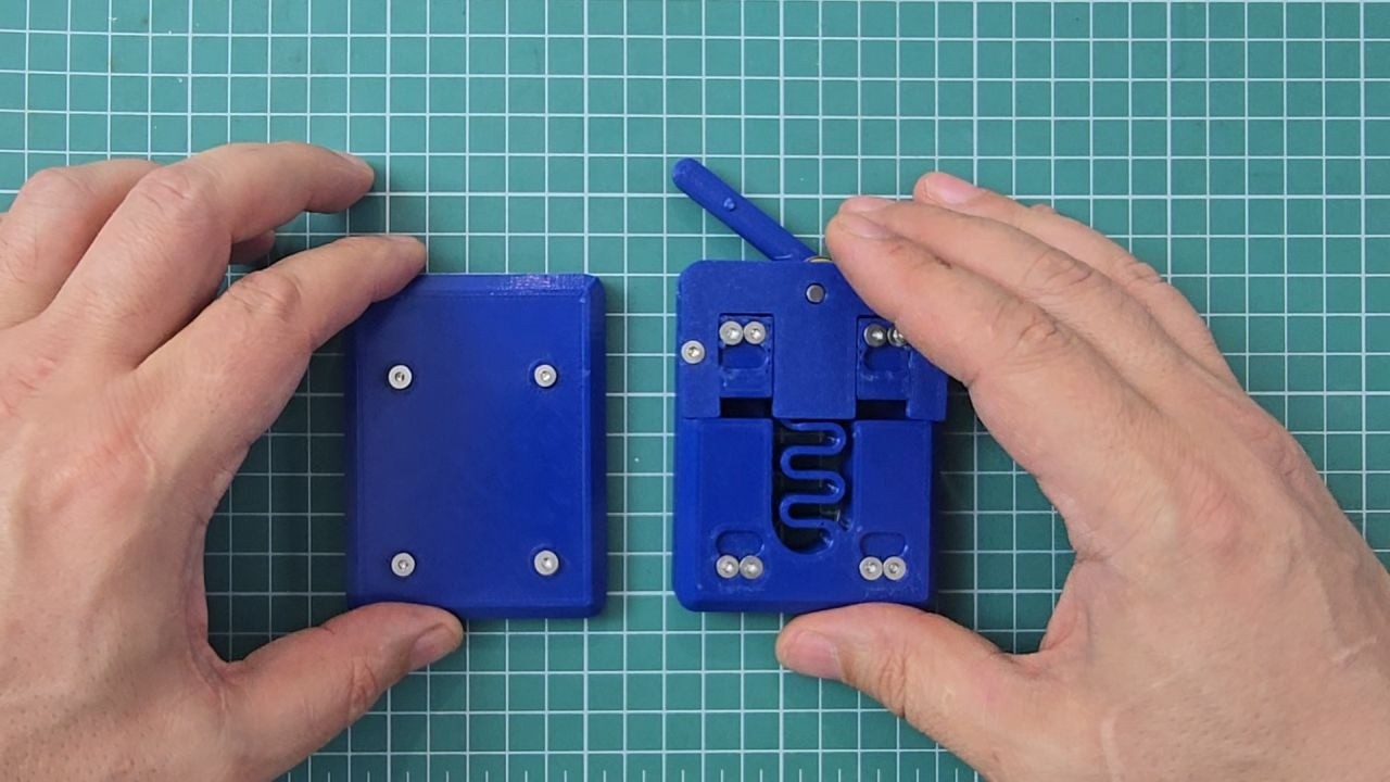 A Hybrid Quick Release: Solving 3D Printed Wear with Metal Interfaces