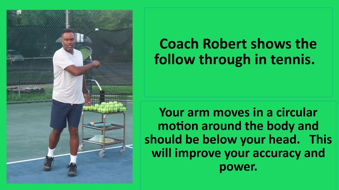 057 Coach Robert shows the follow through in tennis.