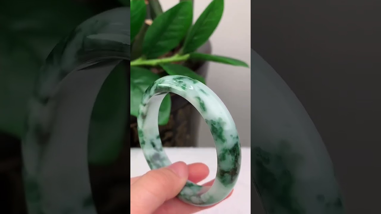 Natural Grade A Jadeite Bangle with Floating Flowers and Circular Design