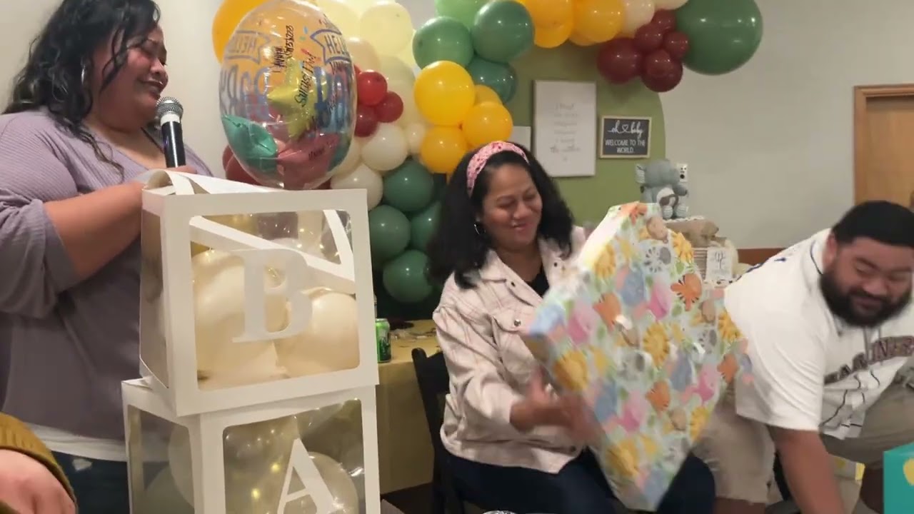 Fishy’s baby shower. Opening gifts