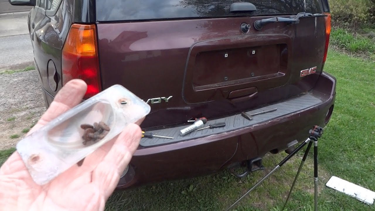 Trailblazer/ Envoy- License plate rusted stuck cover removal Trick