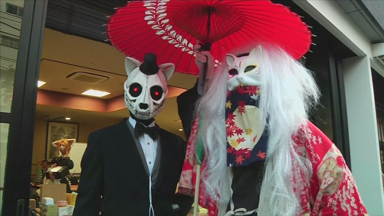 'Ghostly cat' festival parades through streets of Tokyo
