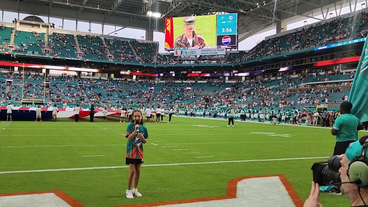 10 yr old Cheyenne Morris singing National anthem at Dolphins game.