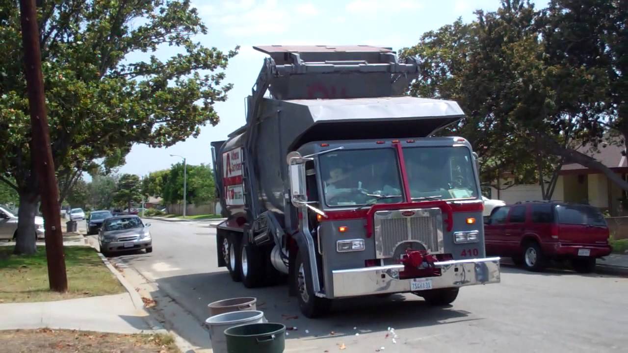 Athens Services - Peterbilt 320 Amrep Hardox Front Loader on manual garbage