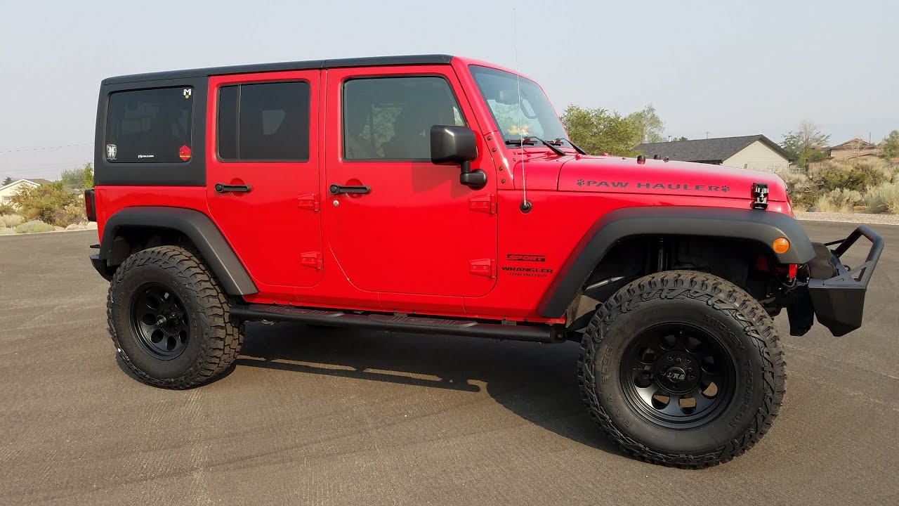 My Jeep JK gets Metal Cloak lift and Mickey Thompson wheels and Baja Boss tires