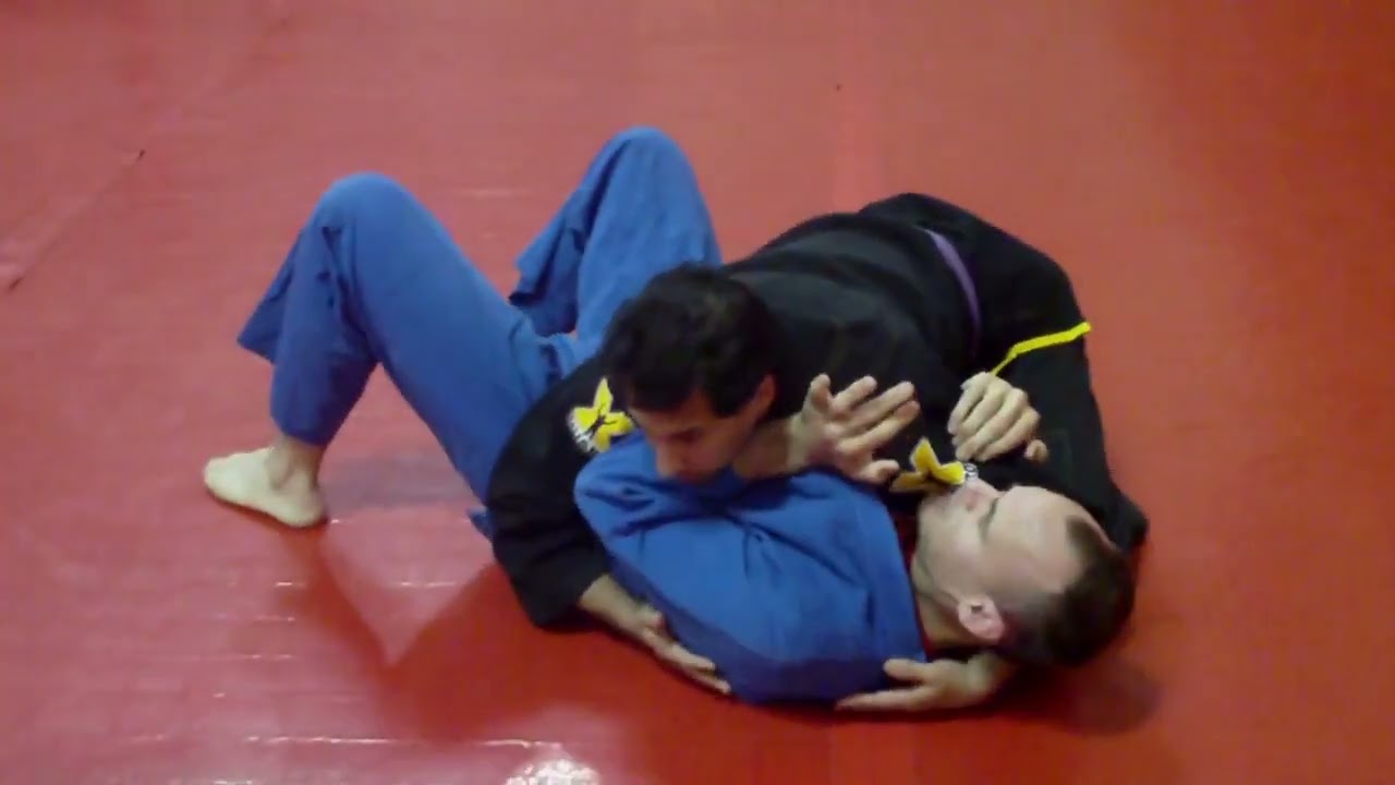 Roll over sweep from empty half guard