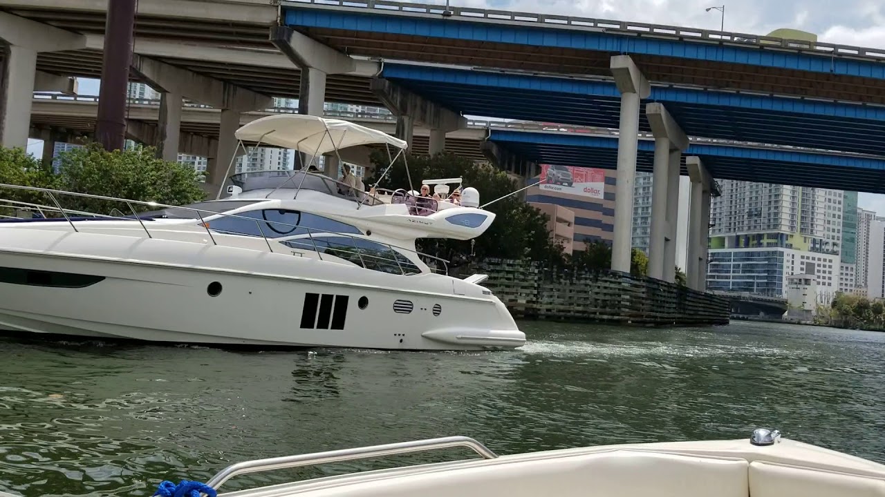 Boating Miami River through Biscayne Bay.