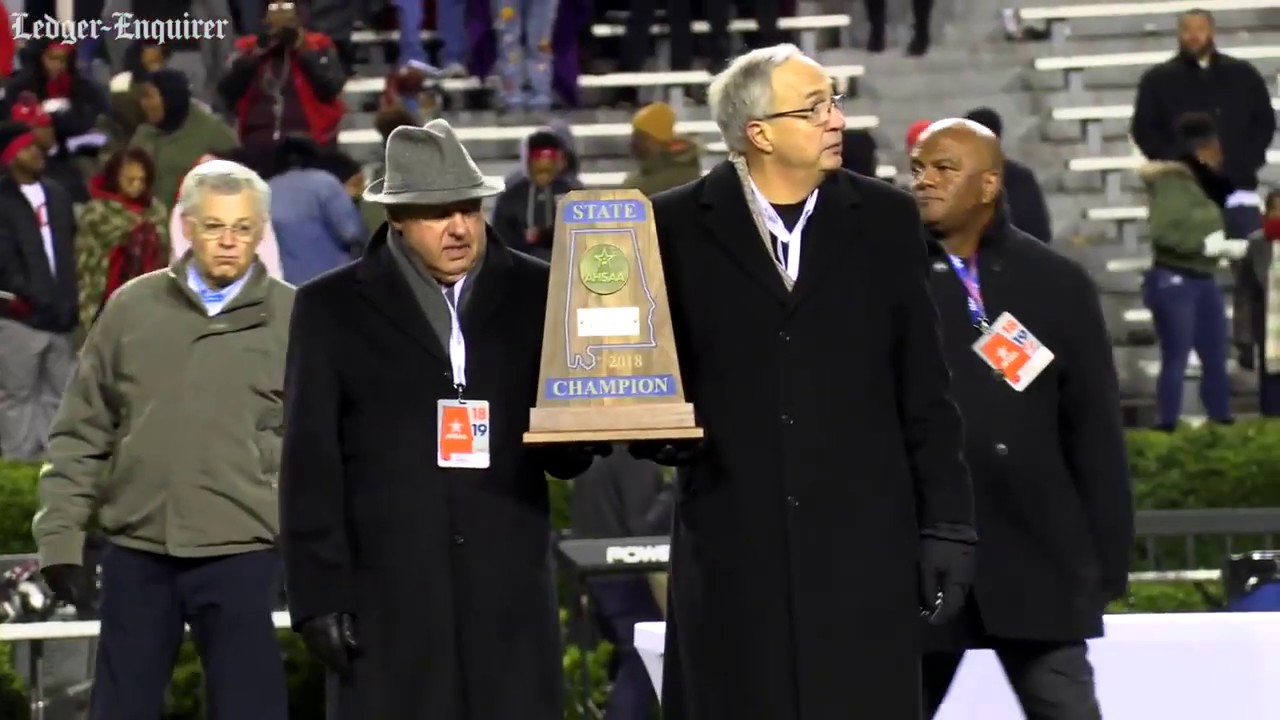 Jamey DuBose and his Central Red Devils accept the state championship trophy