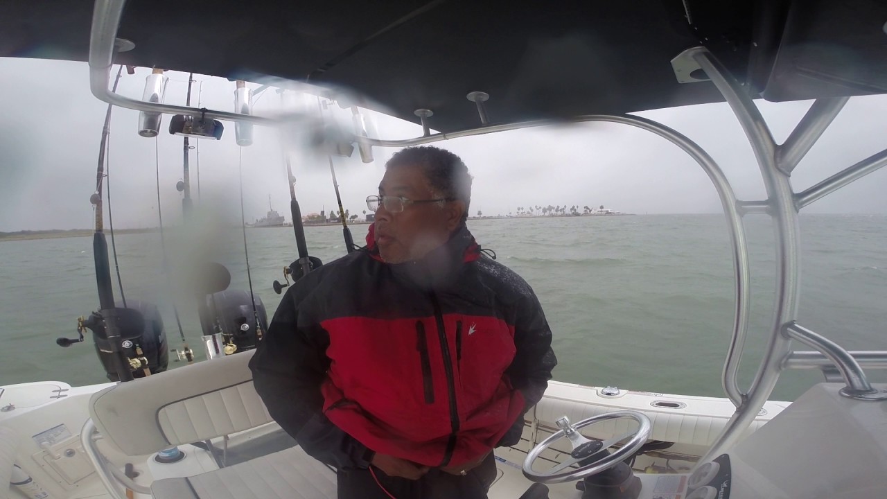 Four W's Fishing Team Mako 234 2016 Running in a rain storm