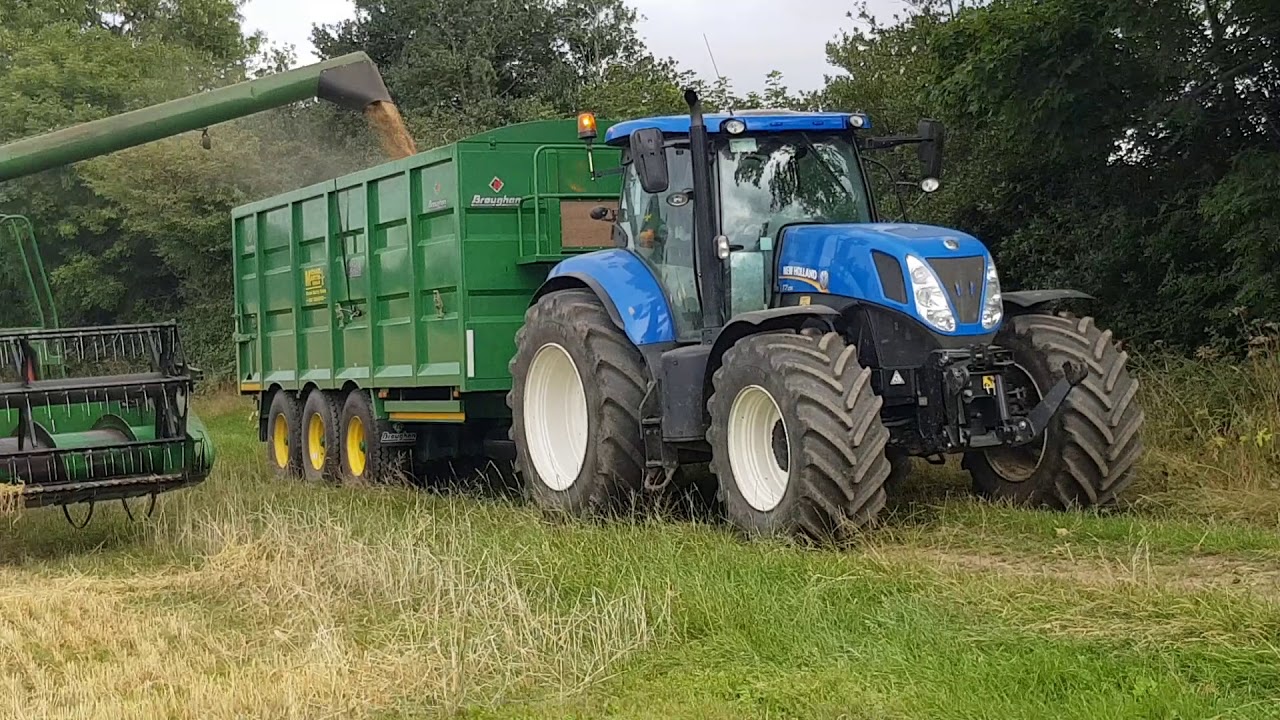 John Deere combine loading grain into a Broughan treble axle trailer in Co.Wexford!
