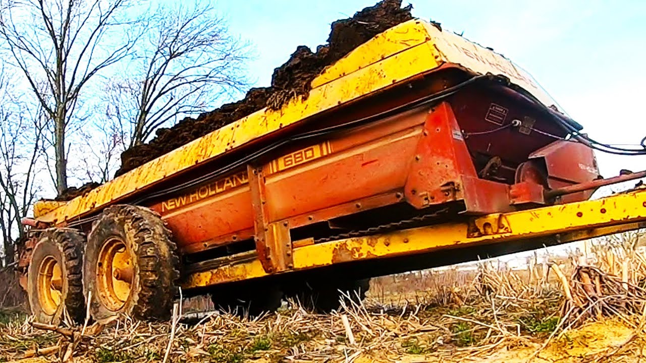 Первый бросок с разбрасывателем навоза New Holland 680
