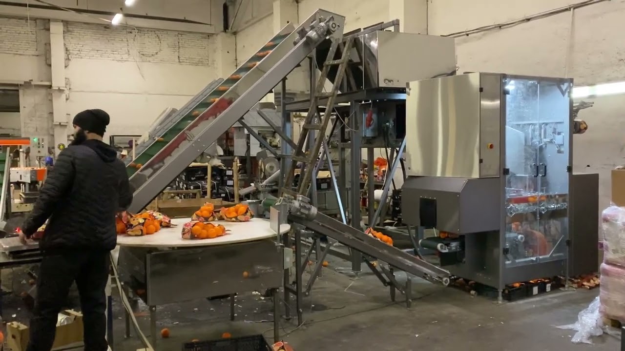 Автоматический упаковщик в сетку-рукав марки SeMer (упаковка 