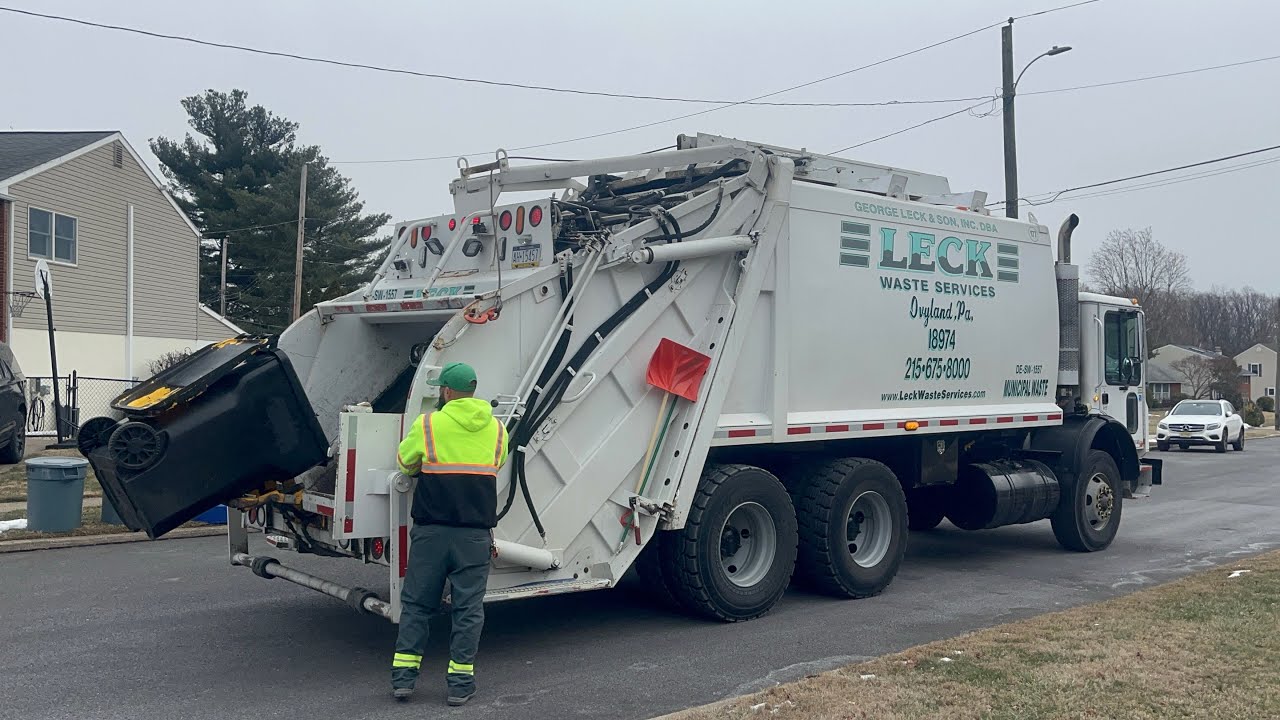 Leck Waste Services Mack MR Leach 2Rll rear loader garbage truck on manual trash