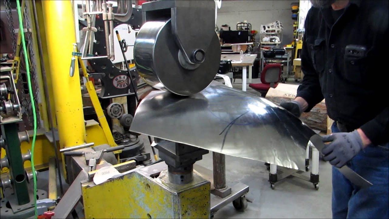 Part 3 Wray Schelin rolls a Jaguar E-Type fender on an English wheel
