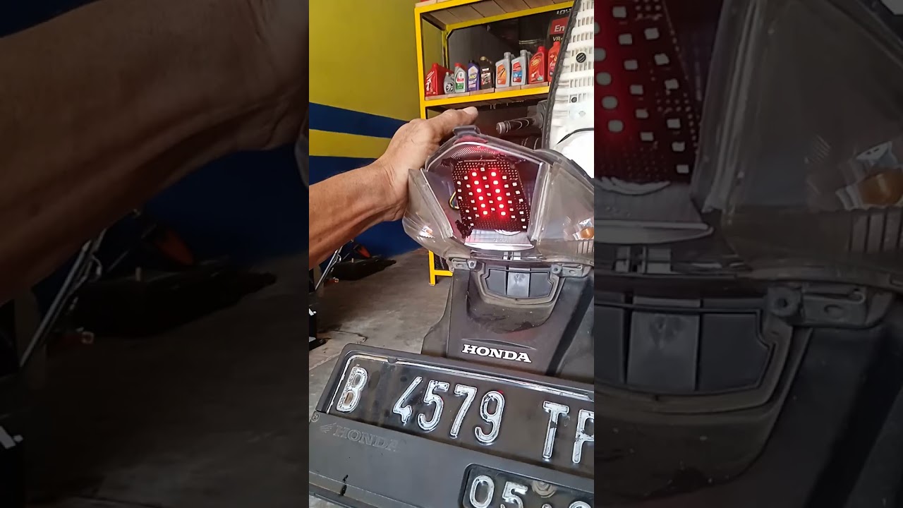 pasang bohlam stop running pada revo fit fi.