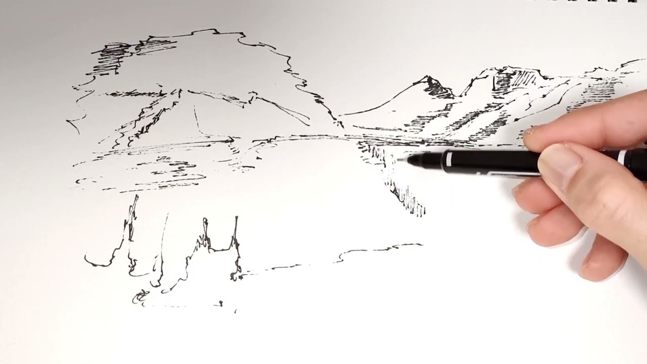 ペンで風景を描く。