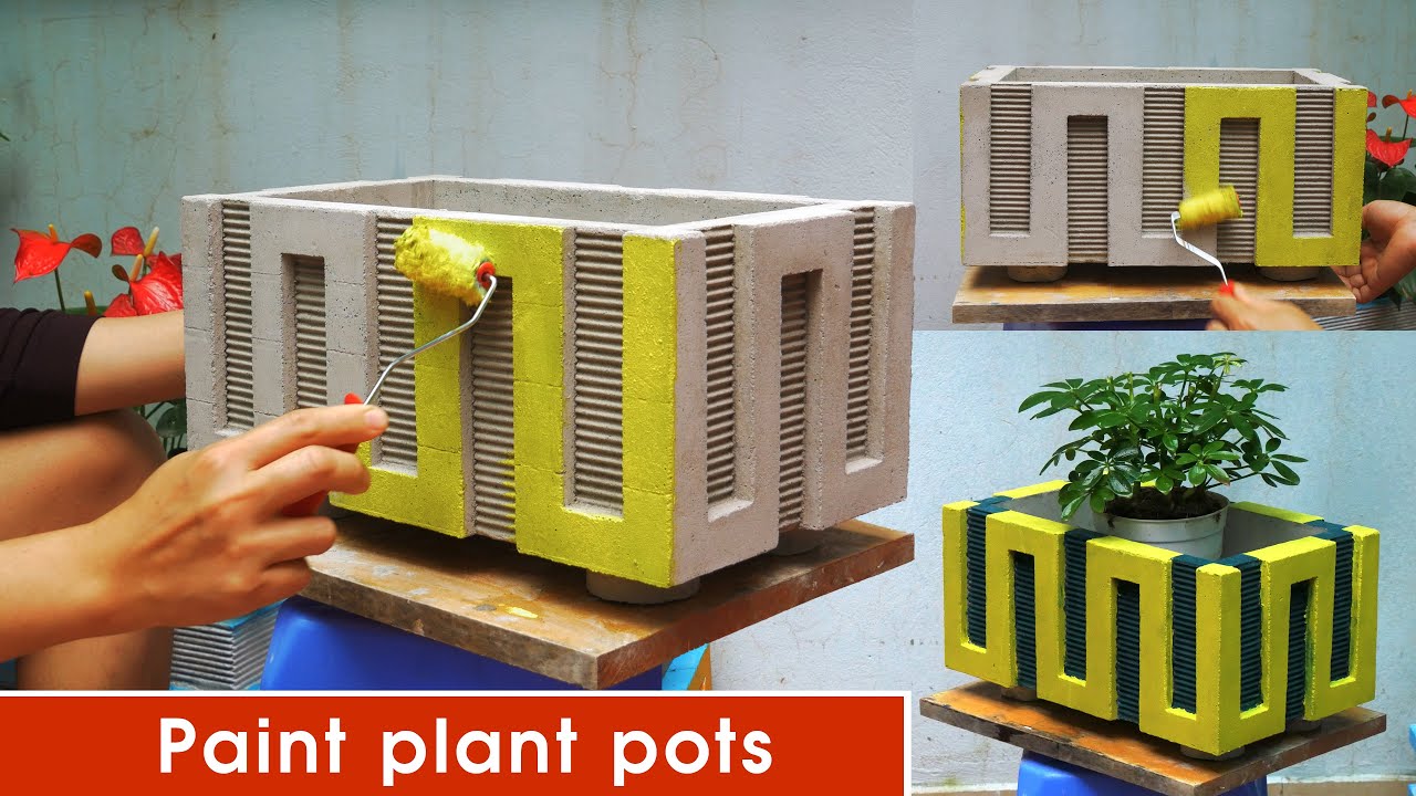 Simple painting idea for plant pots made from cement.