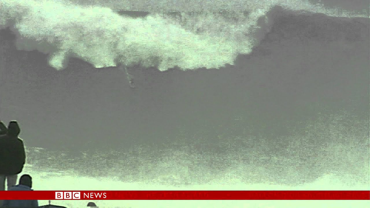 CARLOS BURLE RIDES A GIANT NAZARE WAVE - BBC NEWS