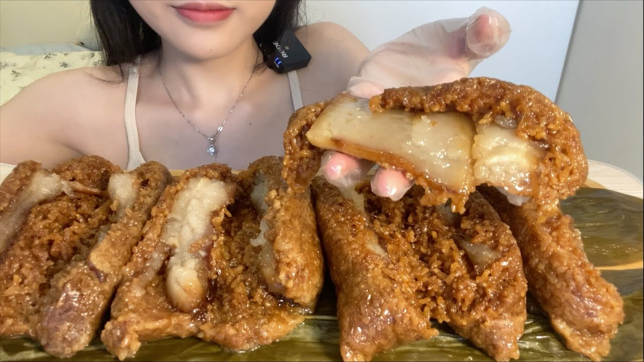 Four big rice dumplings with pork.