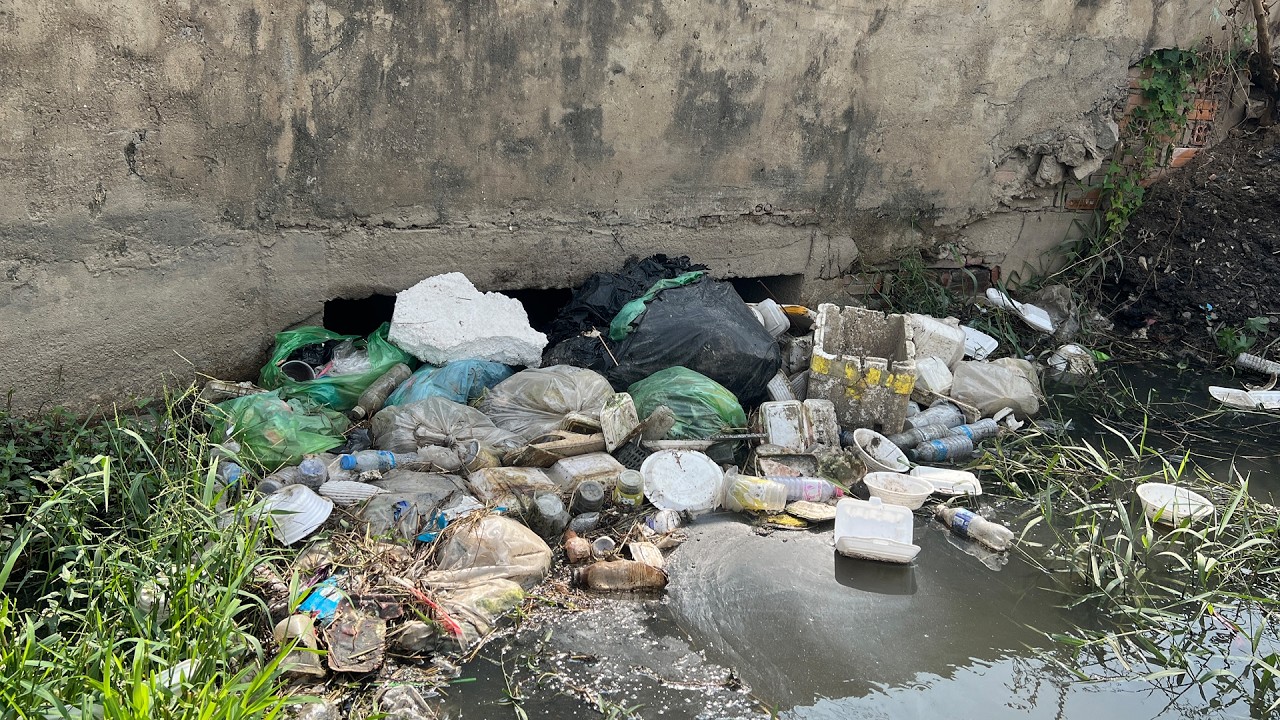 Unclogging a Culvert Drain Full of Plastic Trash! 😱