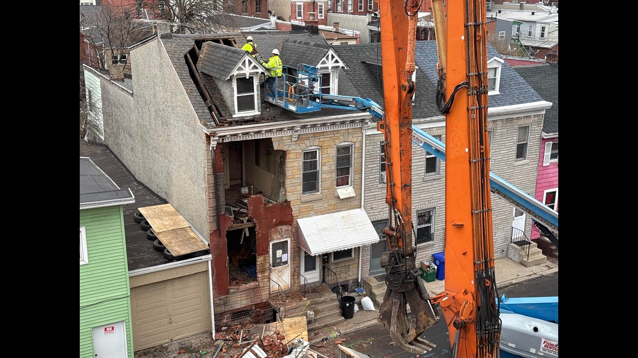 Building demolition at 143 Poplar Street in Reading