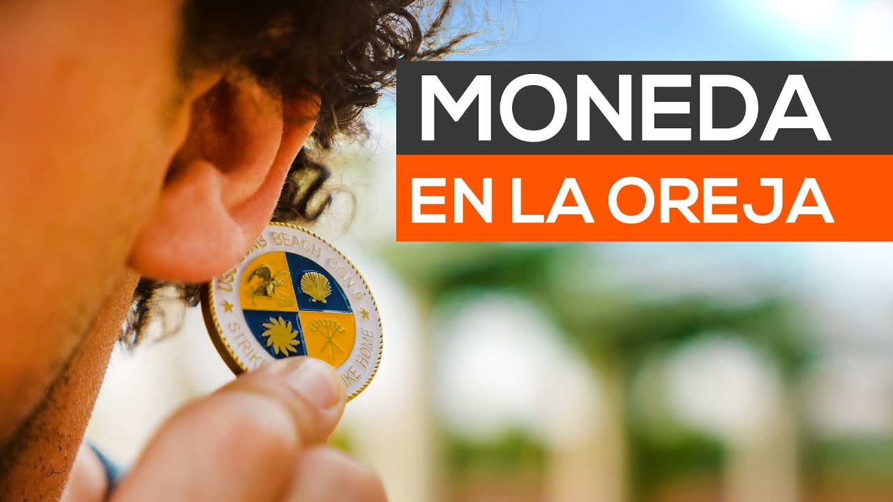 Como sacar una moneda de la oreja o de atras de la oreja - truco de magia revelado