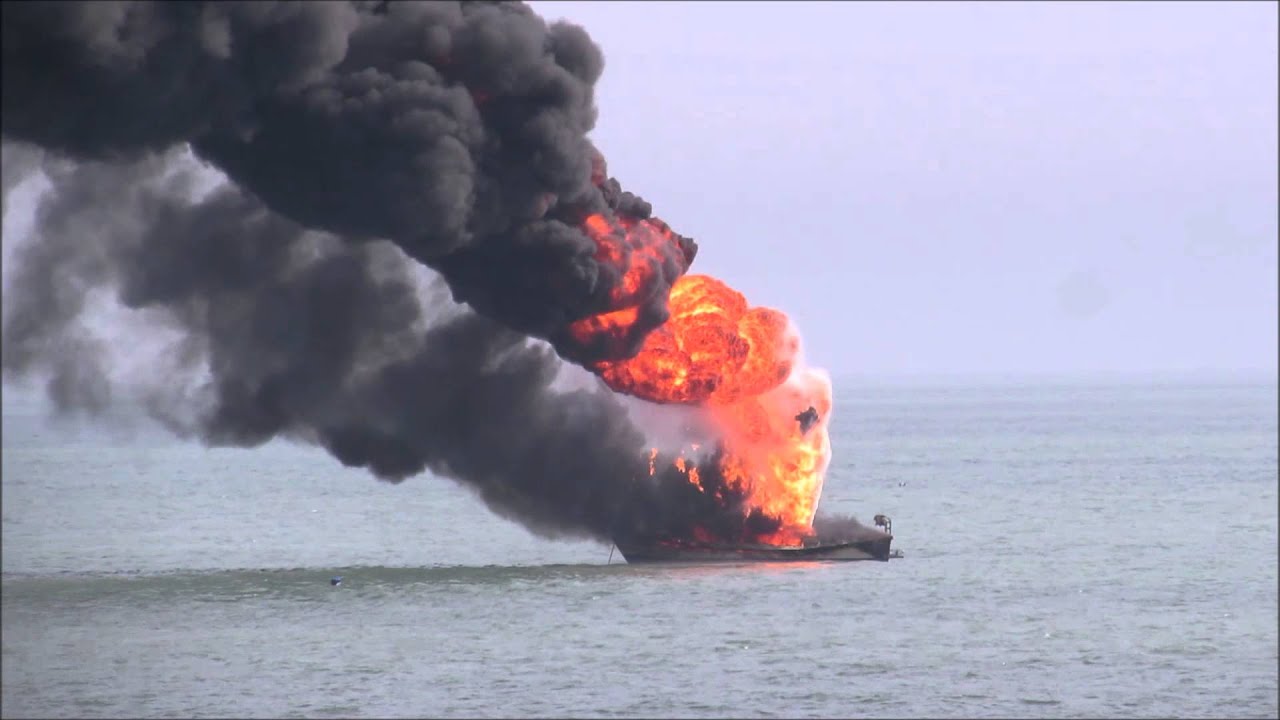 Boat fire Langney Point, Eastbourne - flares up - Shown on BBC news