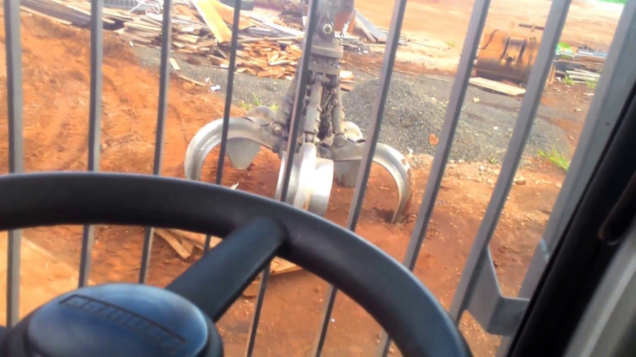 Como operar escavadeira de pneus, Liebherr 924