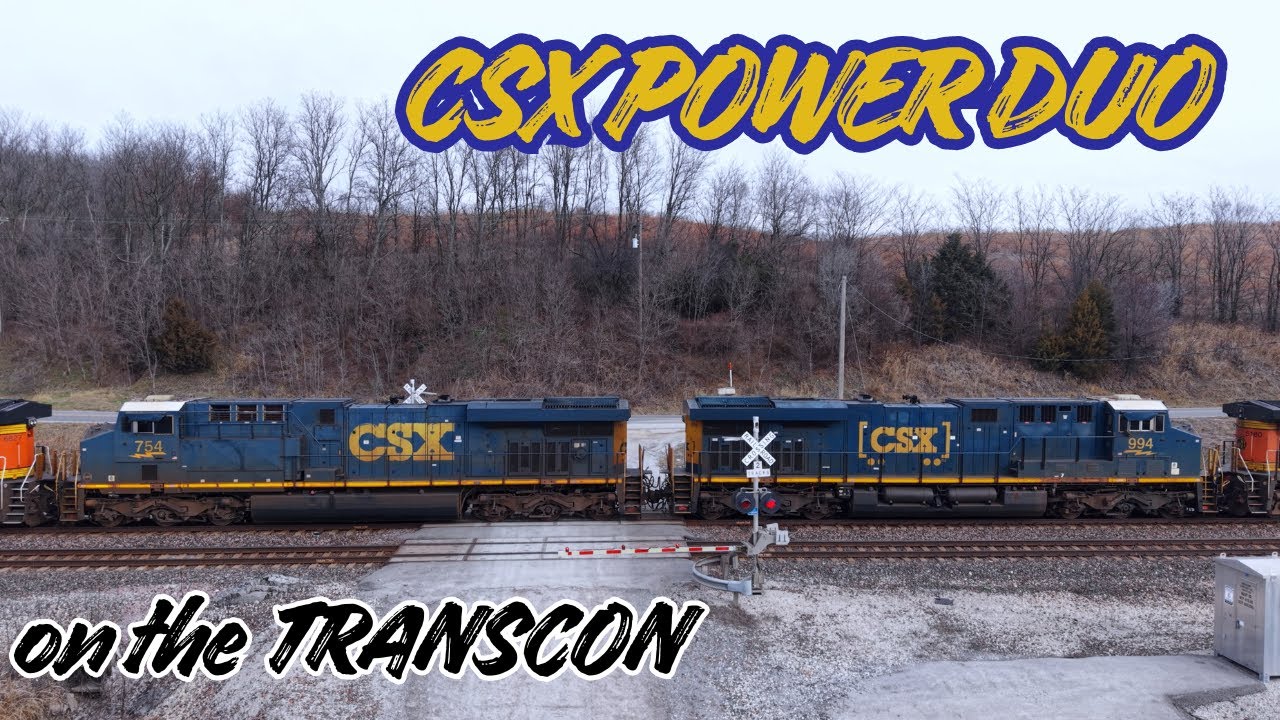 CSX power on the TRANSCON; thunderous throttle up of an empty feed train getting under way at CA Jct