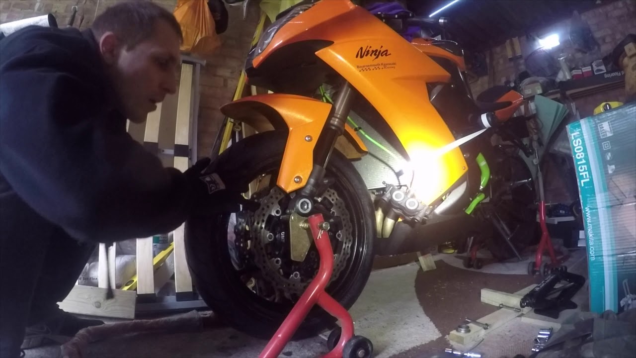 How to remove & put back front wheel on zx10r 2009