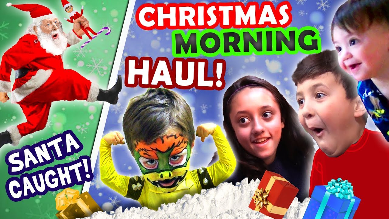 SANTA CAUGHT on CHRISTMAS w  ELF! 🎄 FUNnel Family X Mas HAUL 2016 Presents + North Pole Snow Vlog