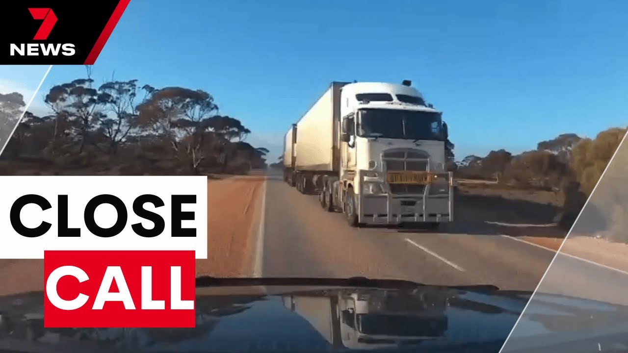 Driver's shocking close call with trucks on remote Eyre Highway | 7NEWS