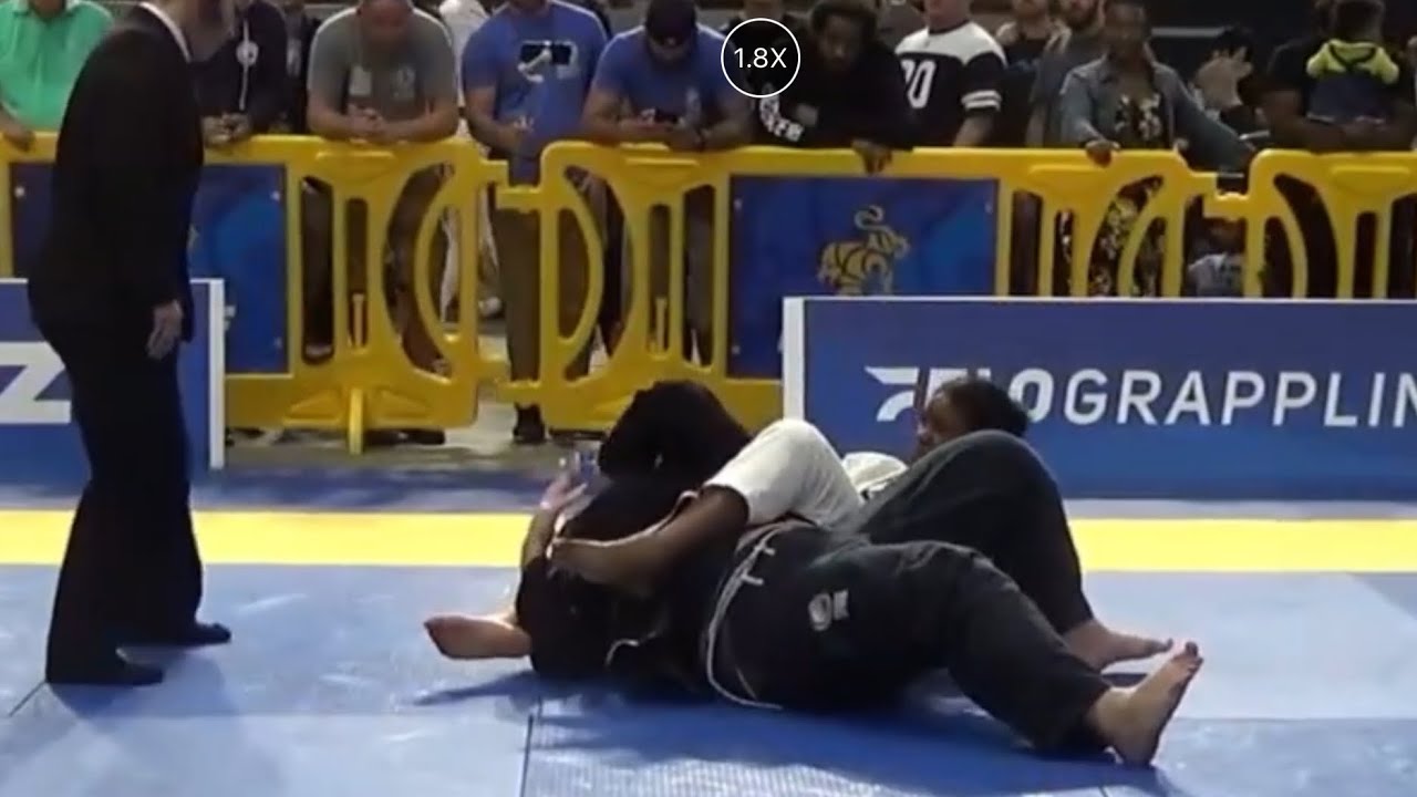 Black girl applies unescapable triangle choke