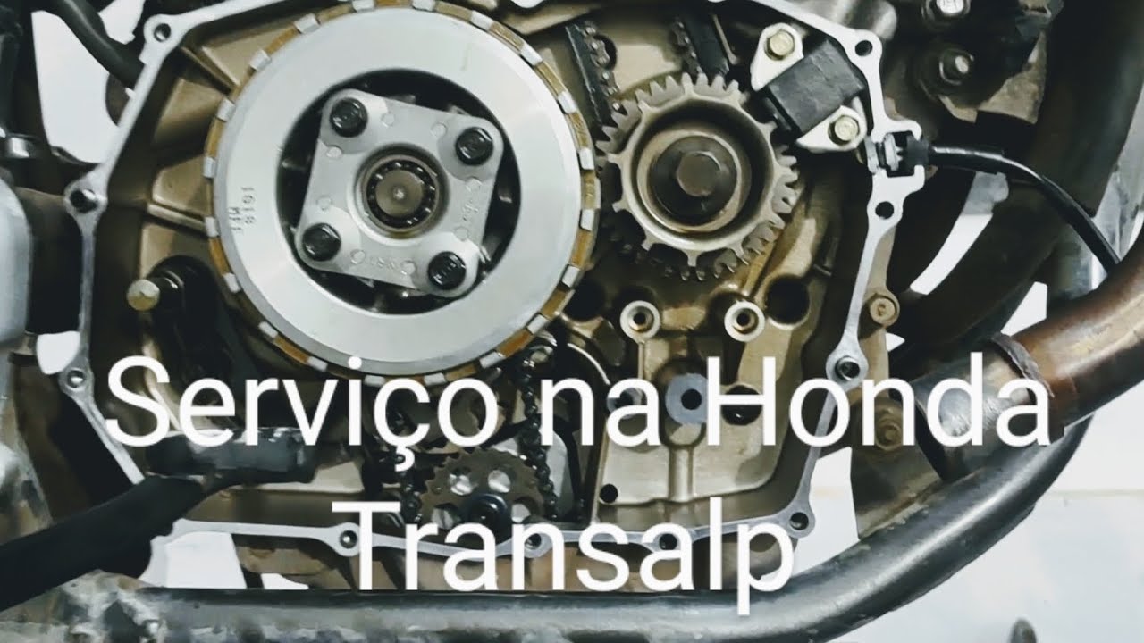 Honda Transalp serviço troca da bobina de pulso, serviço da bóia de combustível, óleo e radiador