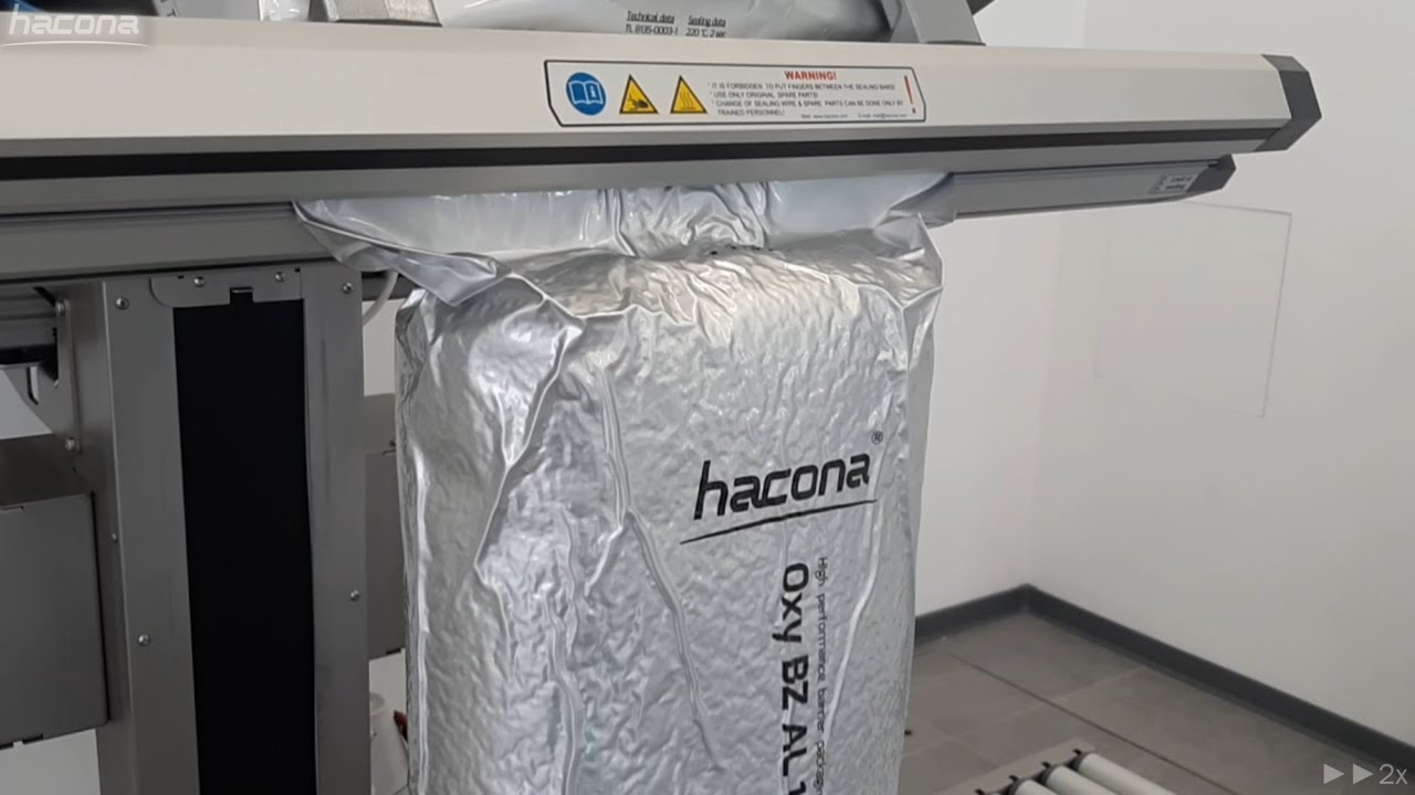 Nuts vacuum packaging with gas flushing MAP - Hacona VI-type industrial vacuum packaging machine