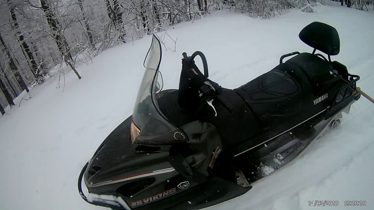 Yamaha rs viking 1000, driving downhill on the powder snow and over the snowdriftes, Crni Vrh Serbia