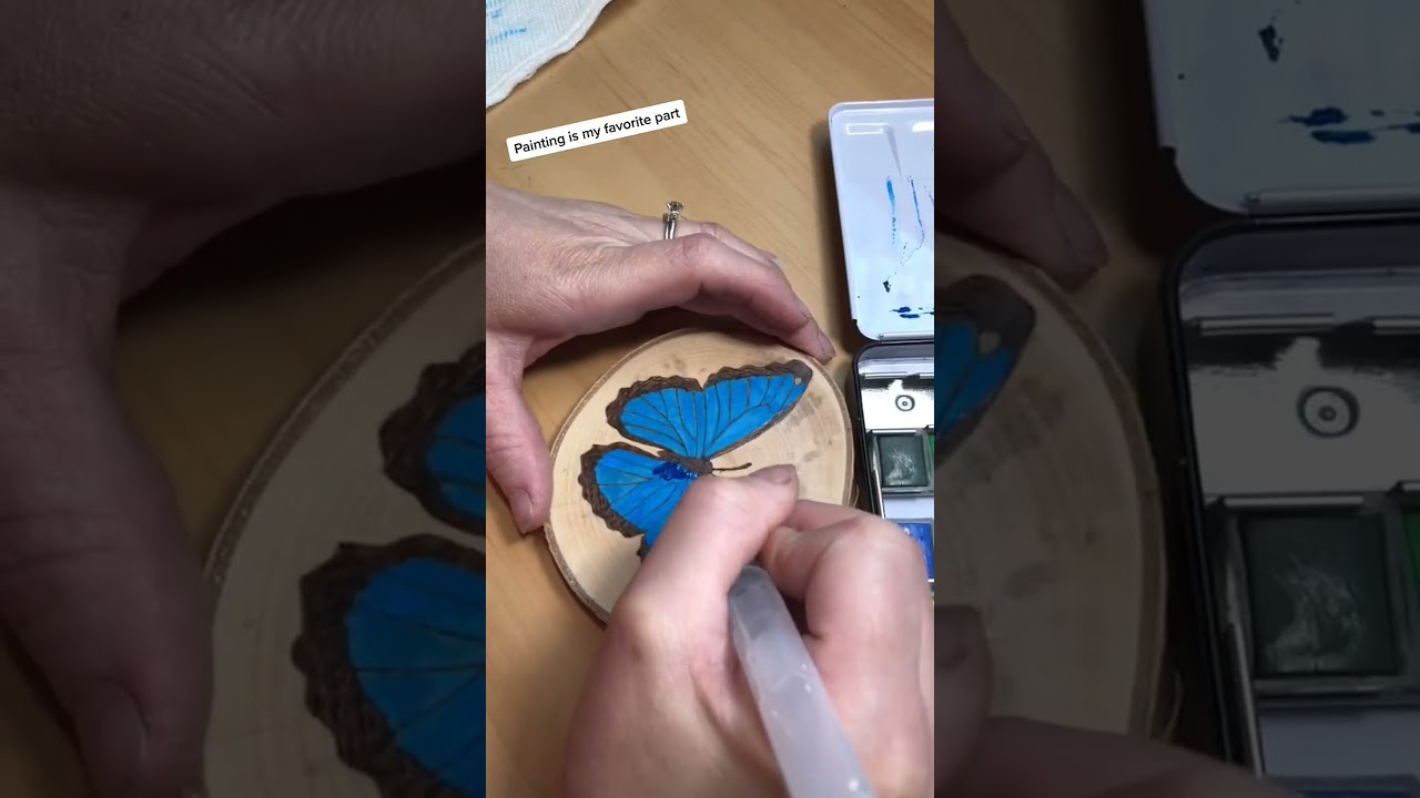 Watercolor butterfly painting on wood