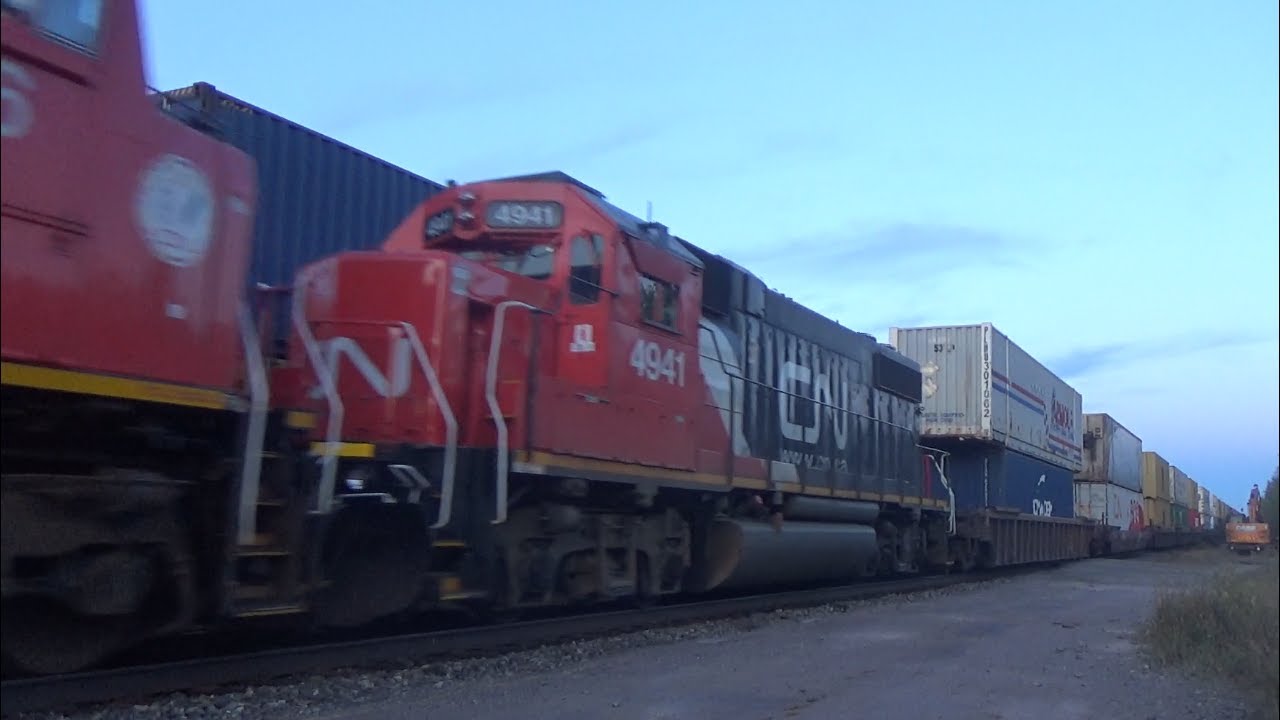 Nice Lashup on a Big Stack Train CN 120 w/DPU Rolling pass Springhill Junction, NS - Meeting CN X121