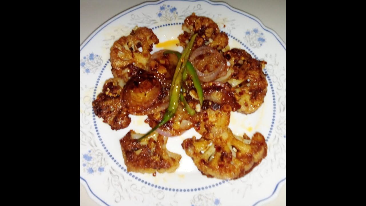 Making a new cauliflower dish very easy to make and tasty, you can it with anything.#food#delicious.
