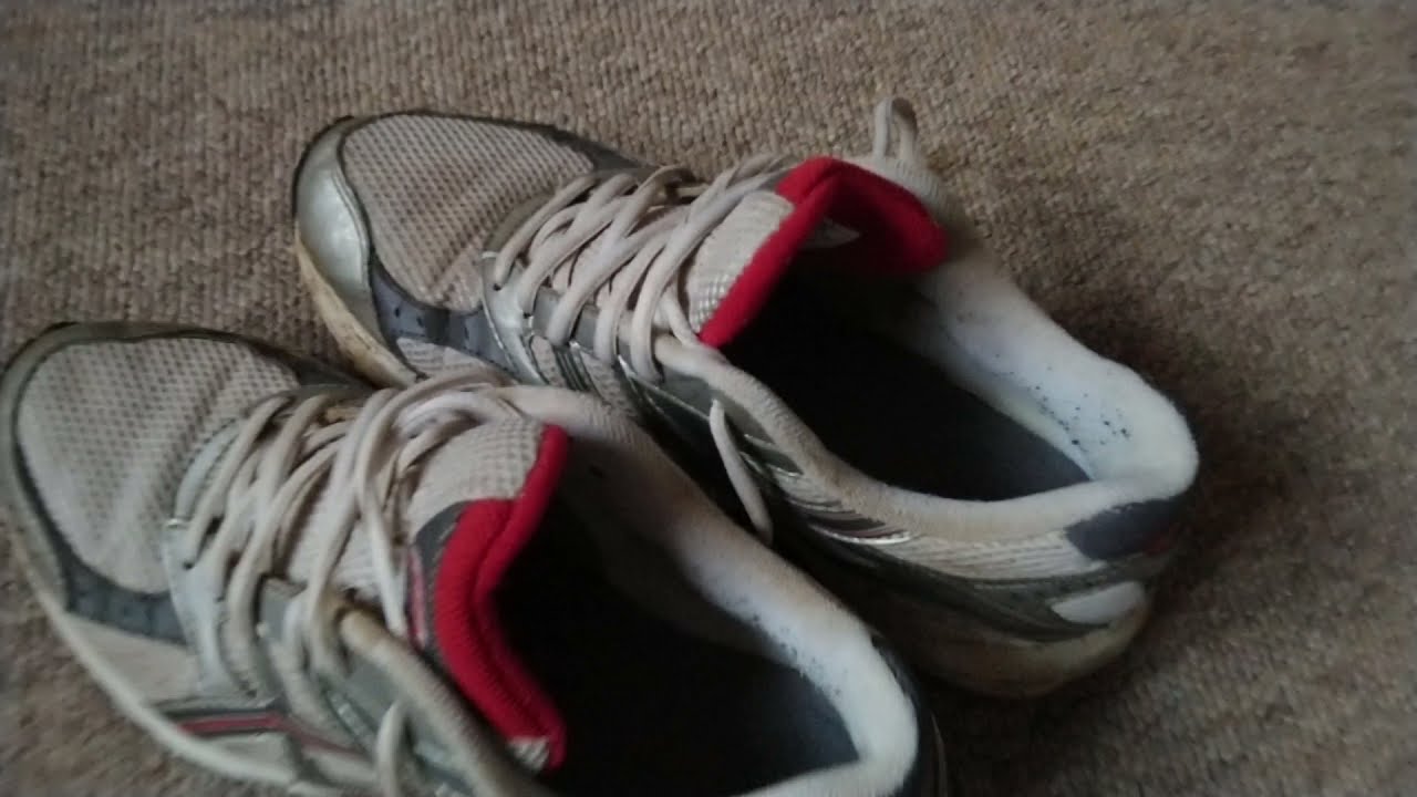 Well worn Asics running shoes