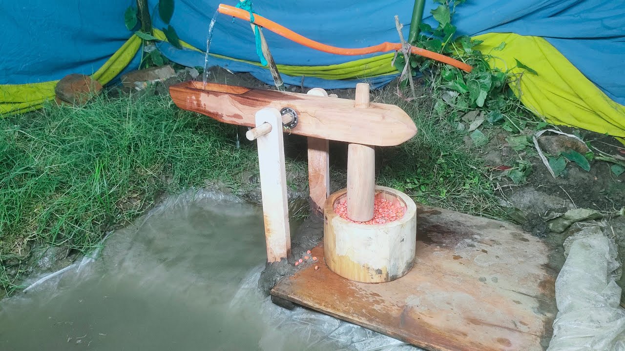 water powered pounder corn mill live